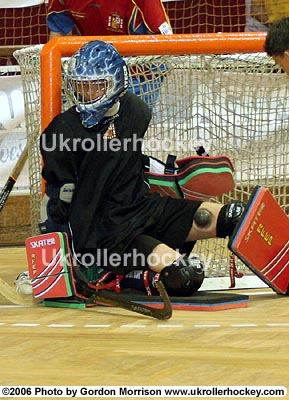 Goal keeper being struck with a ball